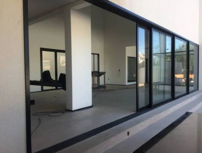 porta de acm fabricada e instalada por Portaço