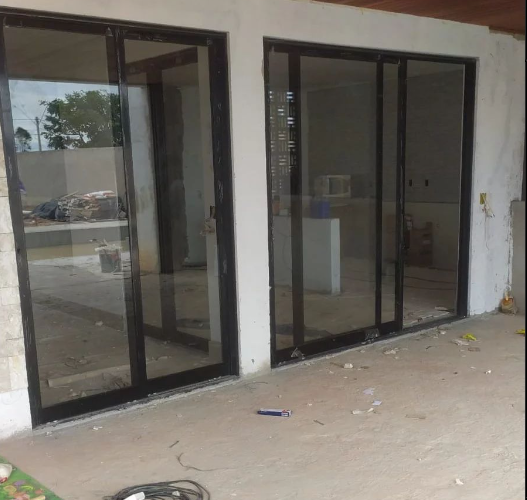 porta de acm fabricada e instalada por Portaço